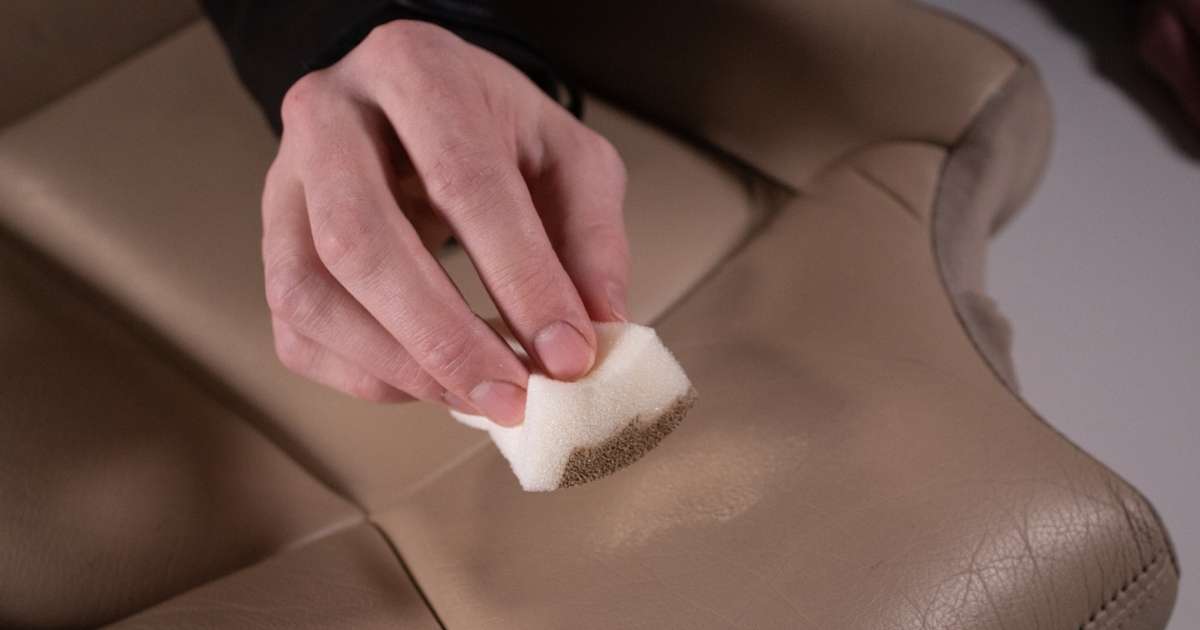 Applying leather paint to a leather car seat